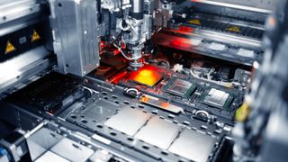  photo shows a factory tool that places lids on data center system-on-chips at an Intel fab in Chandler, Arizona, in December 2023. In February 2024, Intel Corporation launched Intel Foundry as the world’s first systems foundry 