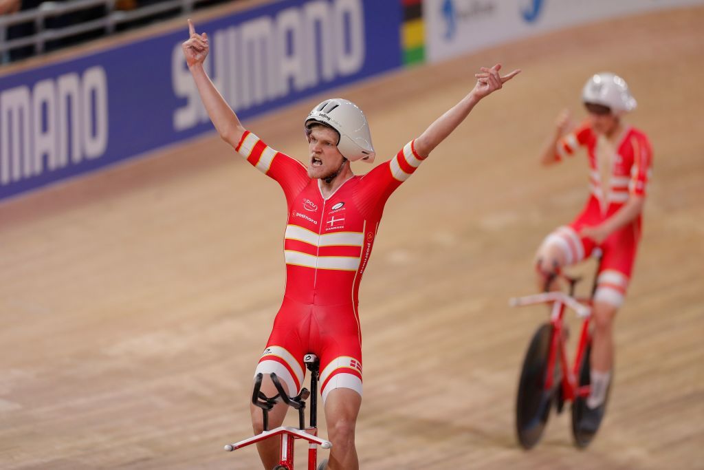 Denmarks Julius Johansen L and his teammates celebrate Gold and a new World Record in the mens Team Pursuit Finals at the UCI track cycling World Championship at the velodrome in Berlin on February 27 2020 Photo by Odd ANDERSEN AFP Photo by ODD ANDERSENAFP via Getty Images