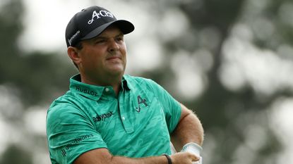 Patrick Reed takes a shot during the first round of the 2023 Masters