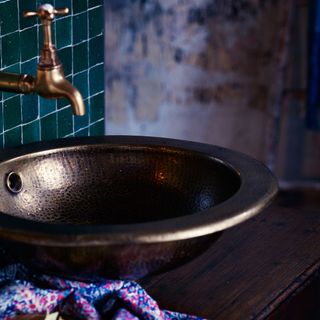 vintage tap and hammered basin
