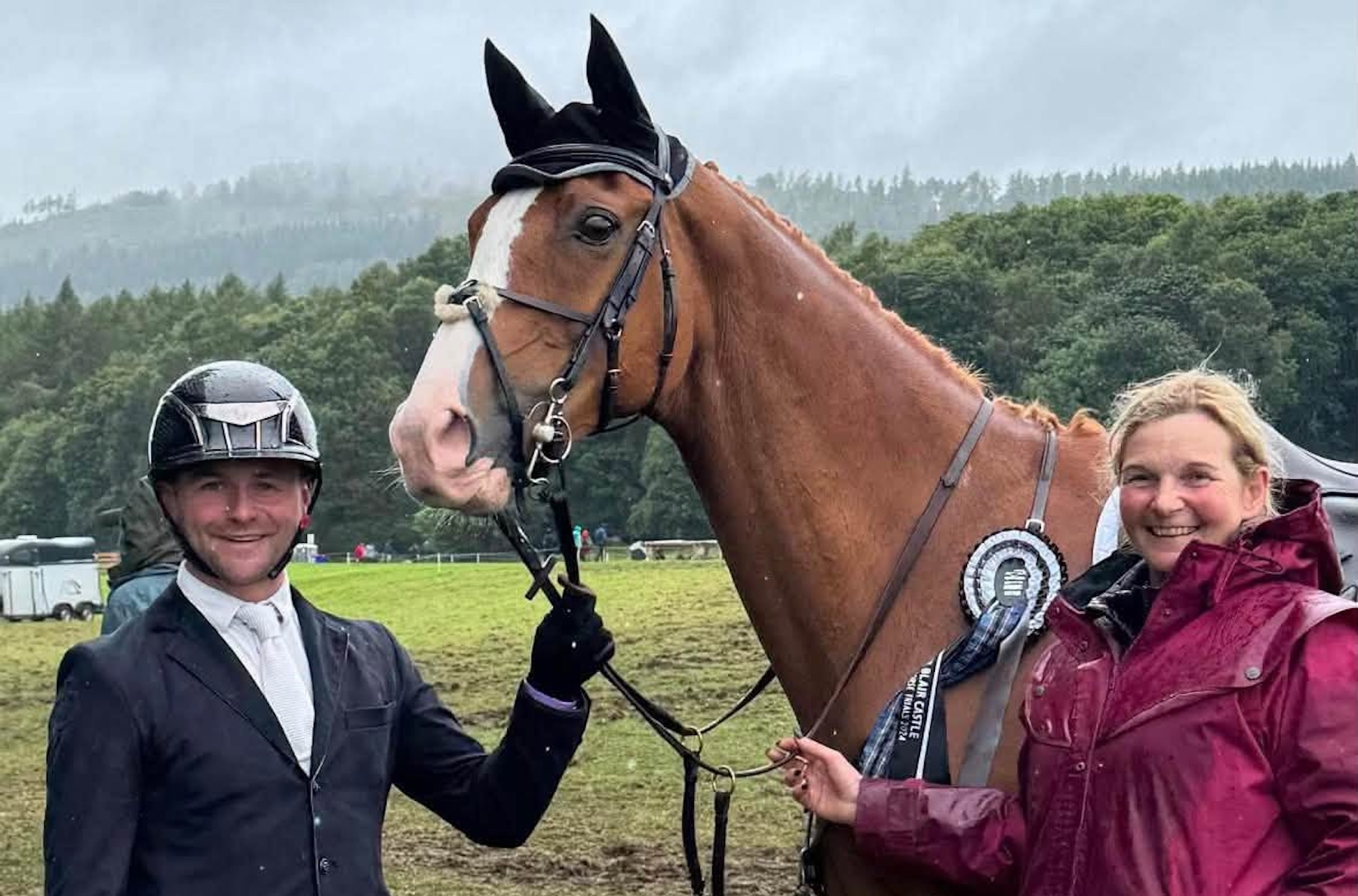 Jack Mantel holds chestnut Night Prowler with Yvette Wheeler at an event