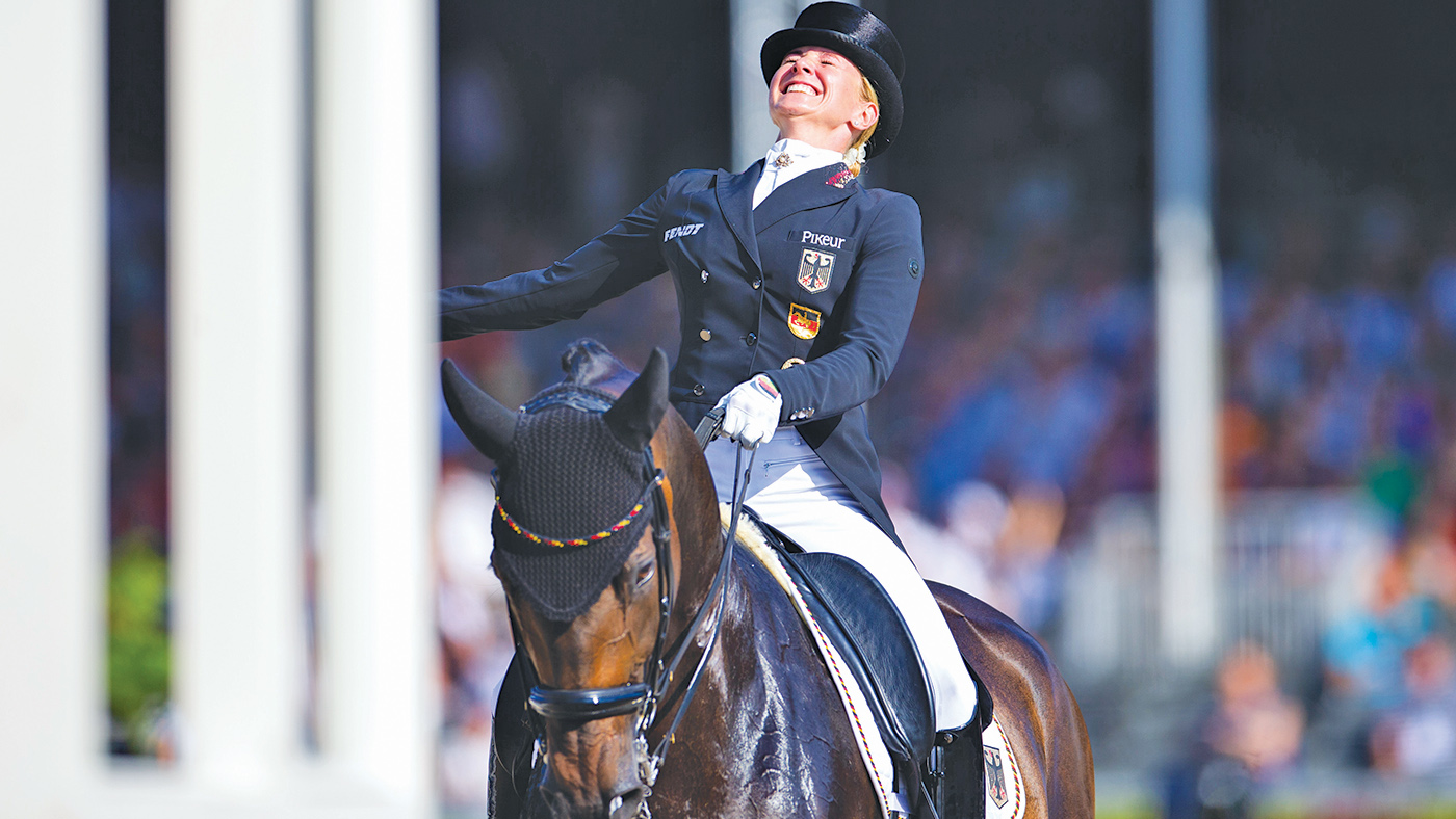 24 August 2019, Netherlands, Rotterdam: European championship, equestrian sport, dressage, Grand Prix Freestyle (freestyle): The rider Jessica von Bredow-Werndl from Germany on the horse Dalera reacts after her ride in the course. Photo: Rolf Vennenbernd/dpa