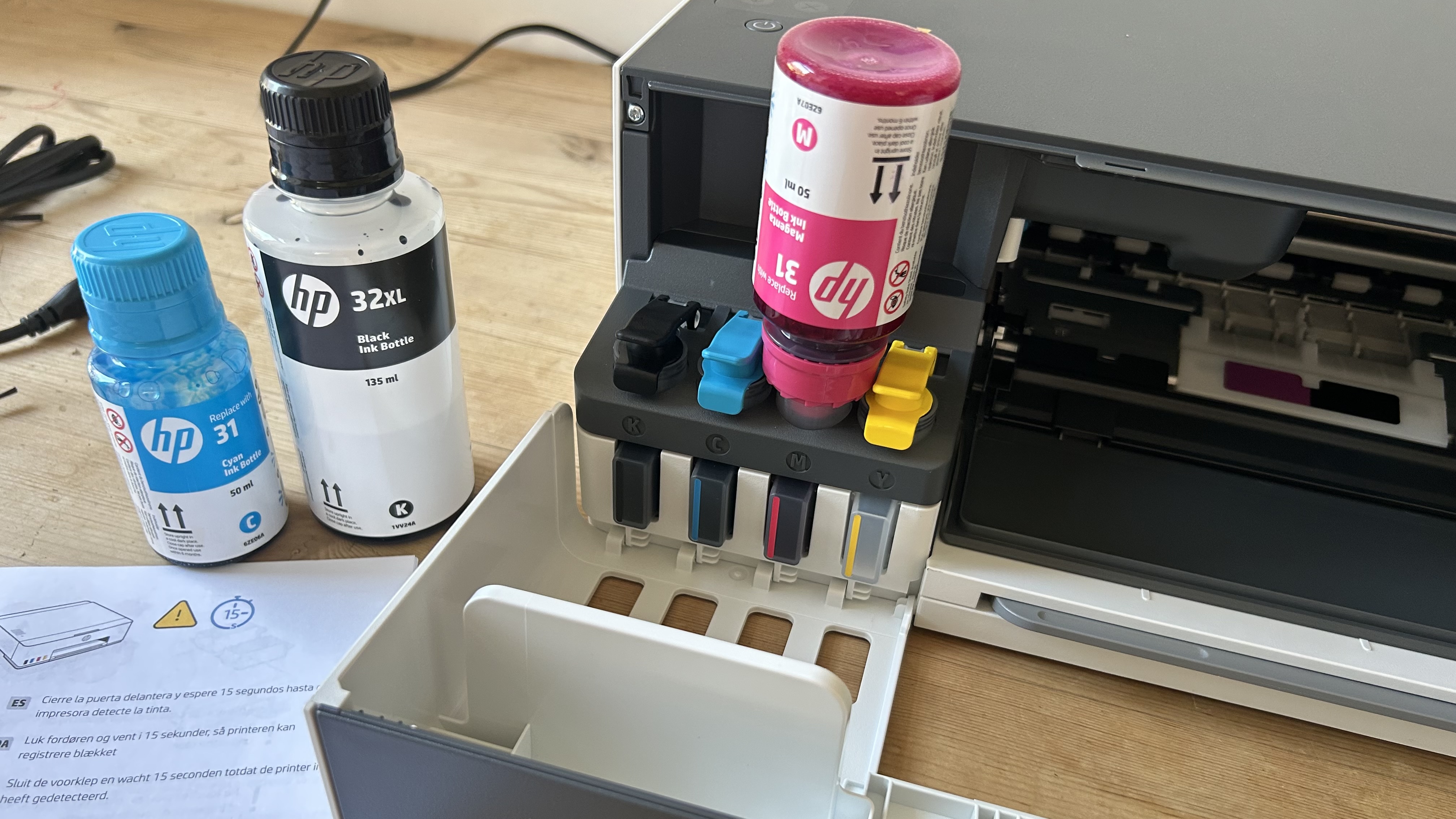 Testing out the HP Smart 210 printer in a home office