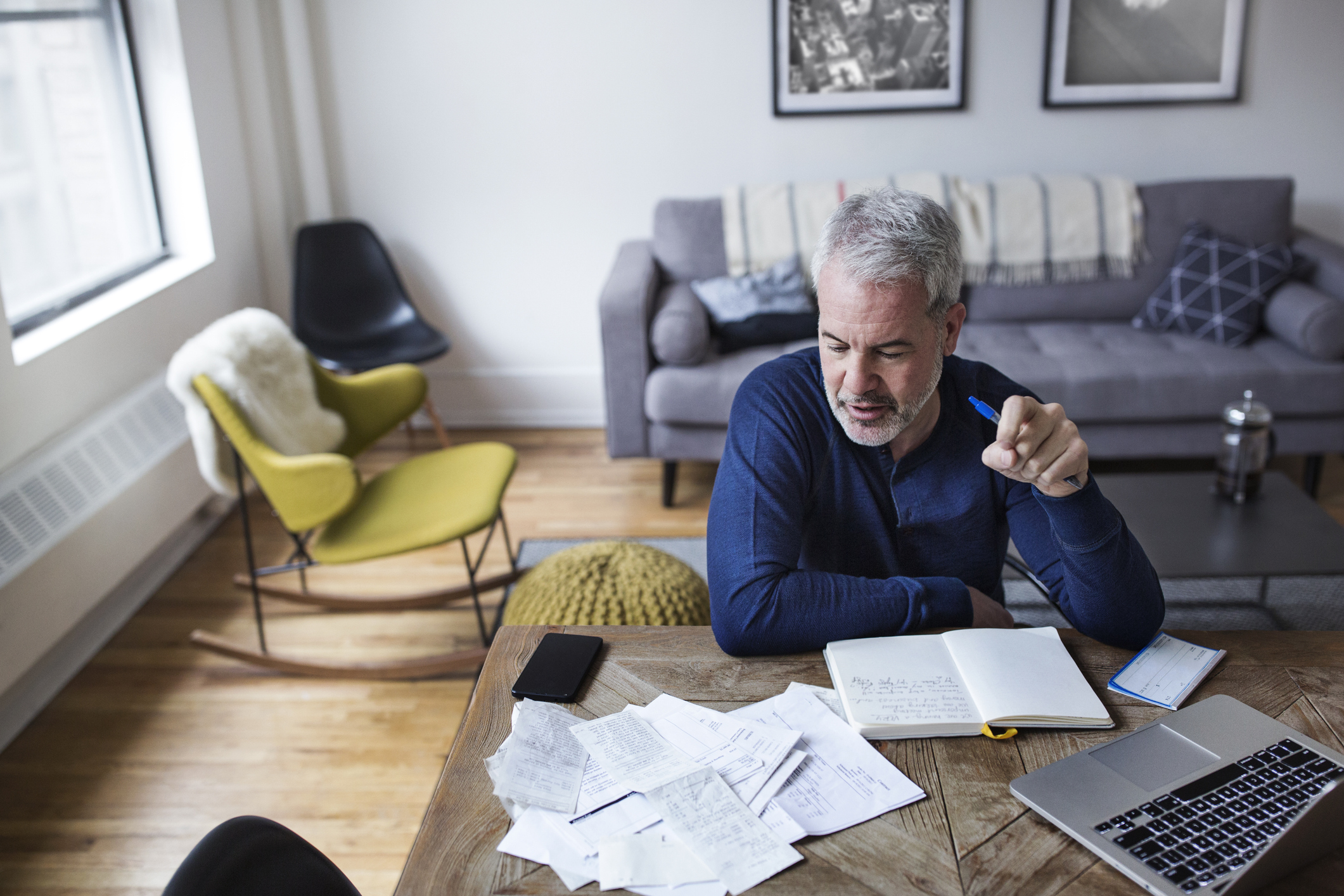 Older man going over paperwork