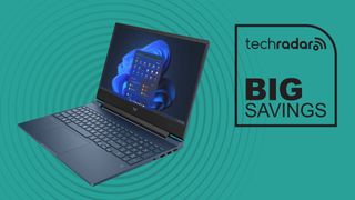 black laptop against blue background