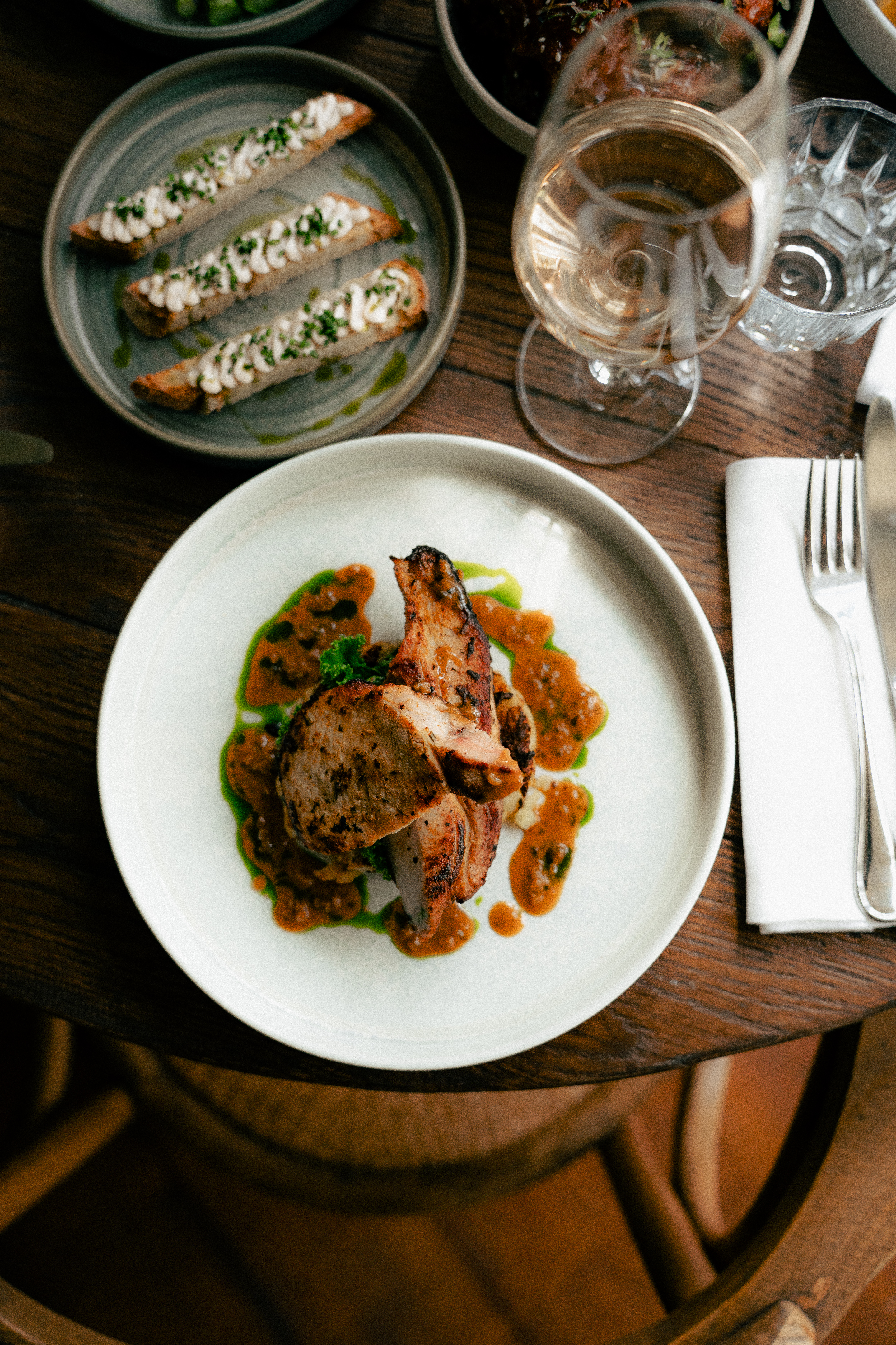 an image of a table laid with food at the brook and badger