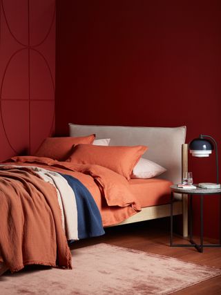John Lewis & Partners linen bedding in burnt orange