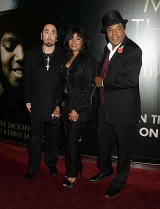 David Gest (left) with Rebbie and Tito Jackson attending the UK premiere of Michael Jackson: The Life Of An Icon