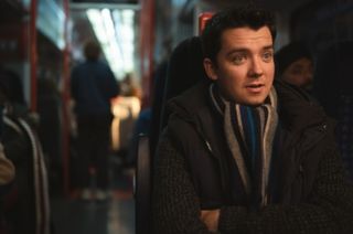 Asa Butterfield as Adam on the wrong train!