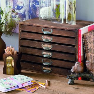 wooden drawers wooden pencil holder and plant