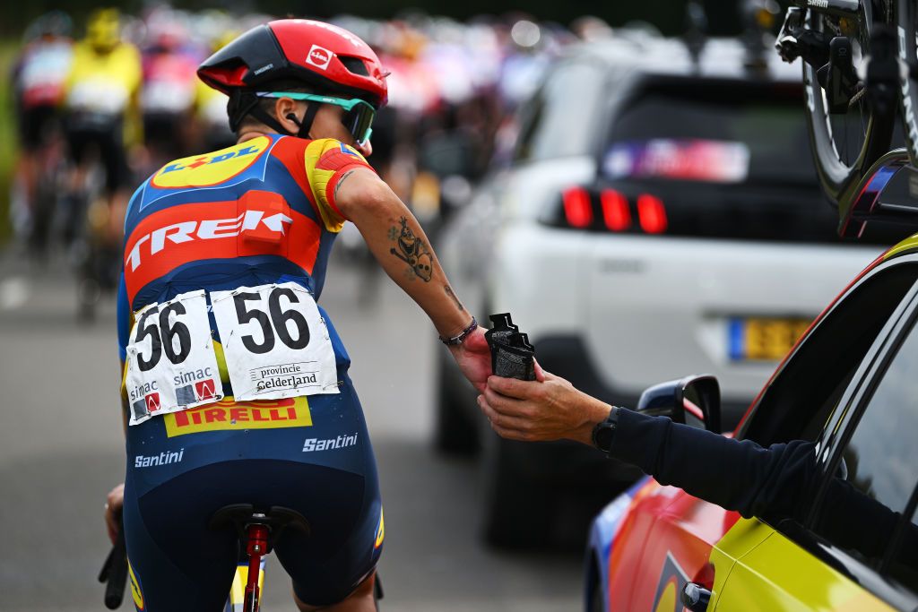 ASSEN NETHERLANDS OCTOBER 09 Ilaria Sanguineti of Italy and Team Lidl Trek competes in the feeding area during the 26th Simac Ladies Tour 2024 Stage 2 a 1548km stage from Coevorden to Assen on October 09 2024 in Assen Netherlands Photo by Luc ClaessenGetty Images
