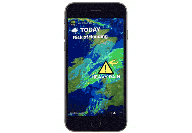 Phone with weather map and text warning a risk of flooding