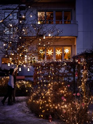 Garden lit up for Christmas with lights from IKEA