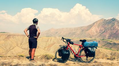 Cyclist with loaded bike