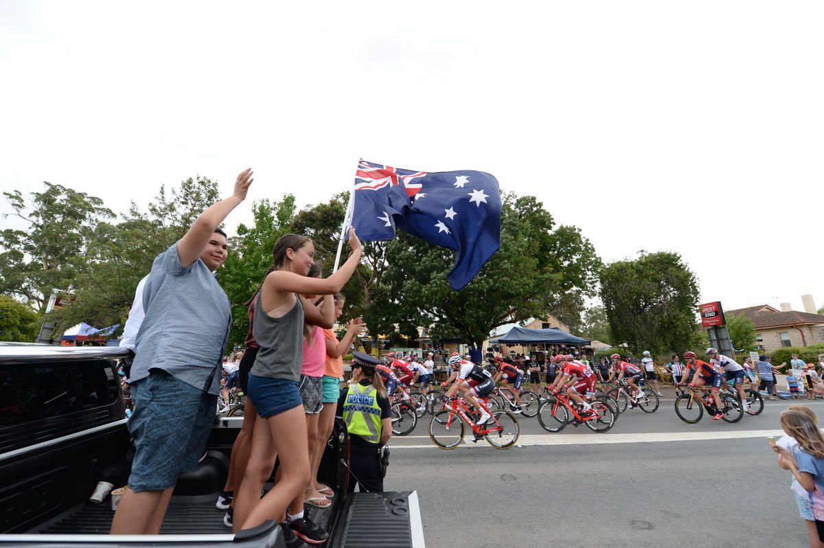 Fans line the roadside