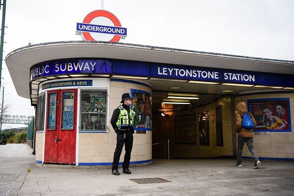 A police officer stands outside the London Tube station Dec. 6, one day after three people were stabbed in what is being investigated as a &amp;quot;terrorist incident&amp;quot;