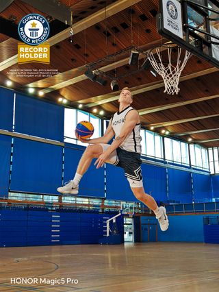 Phone captures basketballer slam dunking