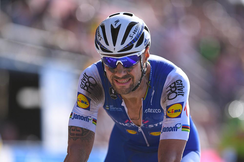 Tom Boonen crosses the Roubaix velodrome finish line for the final time in 2017