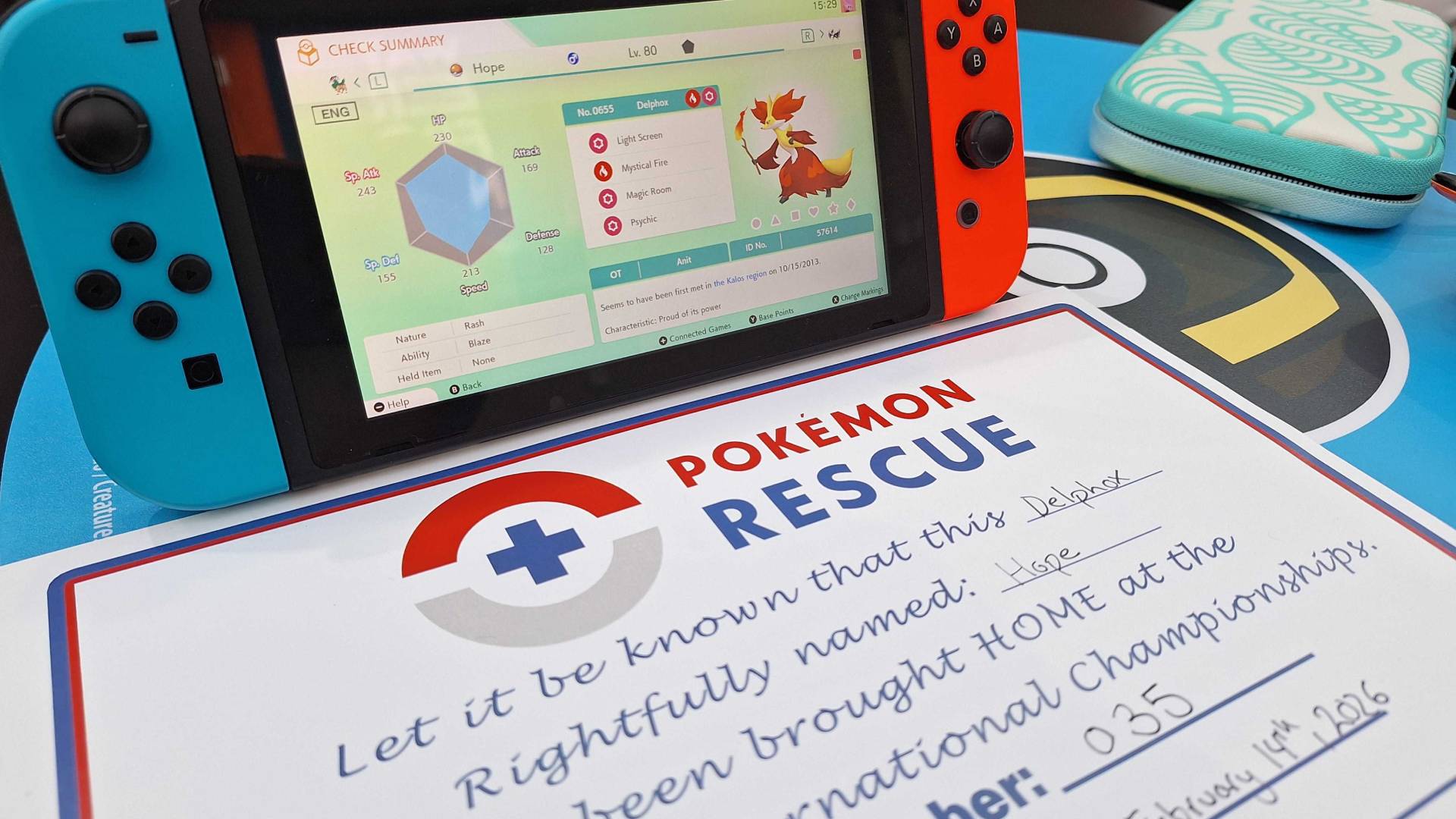 Photo of a Pokemon Rescue certificate and a Delphox on Pokemon Home running on the Nintendo Switch.