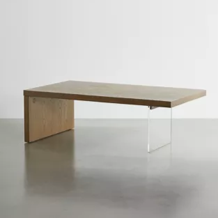 minimalist coffee table with one acrylic leg