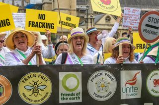 A protest in Parliament Square by anti-fracking Nanas from Lancashire along with other campaigners from around the country calls on the government to stop ignoring science and the will of the people and ban fracking, which threatens the future of both the areas of country in which it is to take place though pollution and earthquakes and the future of the planet through its high level of carbon emissions.