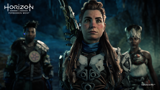 Aloy stands in front of Carl and Zo.