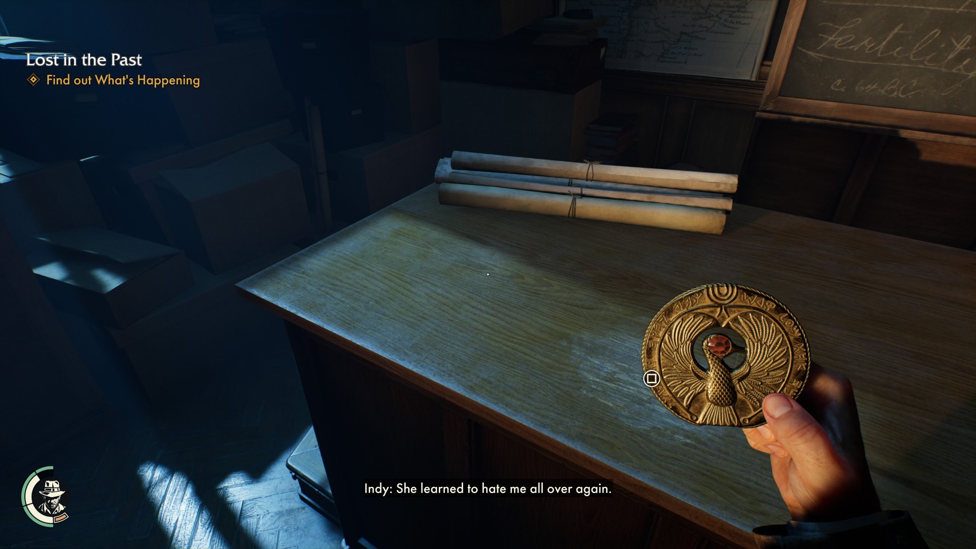Indiana Jones and the Great Circle screenshot of Indiana looking at a golden artifact while saying, "She learned to hate me all over again" during the quest, Lost in the Past