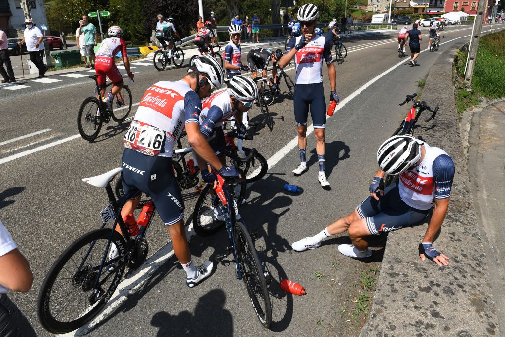 SANTA CRUZ DE BEZANA SPAIN AUGUST 31 LR Antonio Nibali of Italy Gianluca Brambilla of Italy Alex Kirsch of Luxembourg and Team Trek Segafredo attend to his teammate Giulio Ciccone of Italy and Team Trek Segafredo injured after crash during the 76th Tour of Spain 2021 Stage 16 a 180km stage from Laredo to Santa Cruz de Bezana lavuelta LaVuelta21 on August 31 2021 in Santa Cruz de Bezana Spain Photo by Tim de WaeleGetty Images