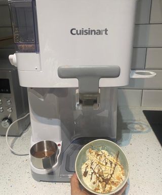 Vanilla soft serve ice cream with melted chocolate sauce and chopped peanuts made using the Cuisinart Soft Serve Ice Cream Maker