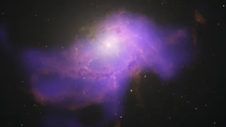 A purple hazy cluster against a dark background of space.