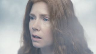 Amy Adams looking in shock in a screenshot from Arrival.