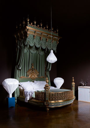 Large modern white lamp shades in antique bedroom