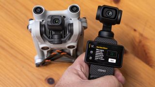 DJI Mini 3 Pro being used as a gimbal camera next to DJI Osmo Pocket 3 as a potential moneysaving alternative with table behind