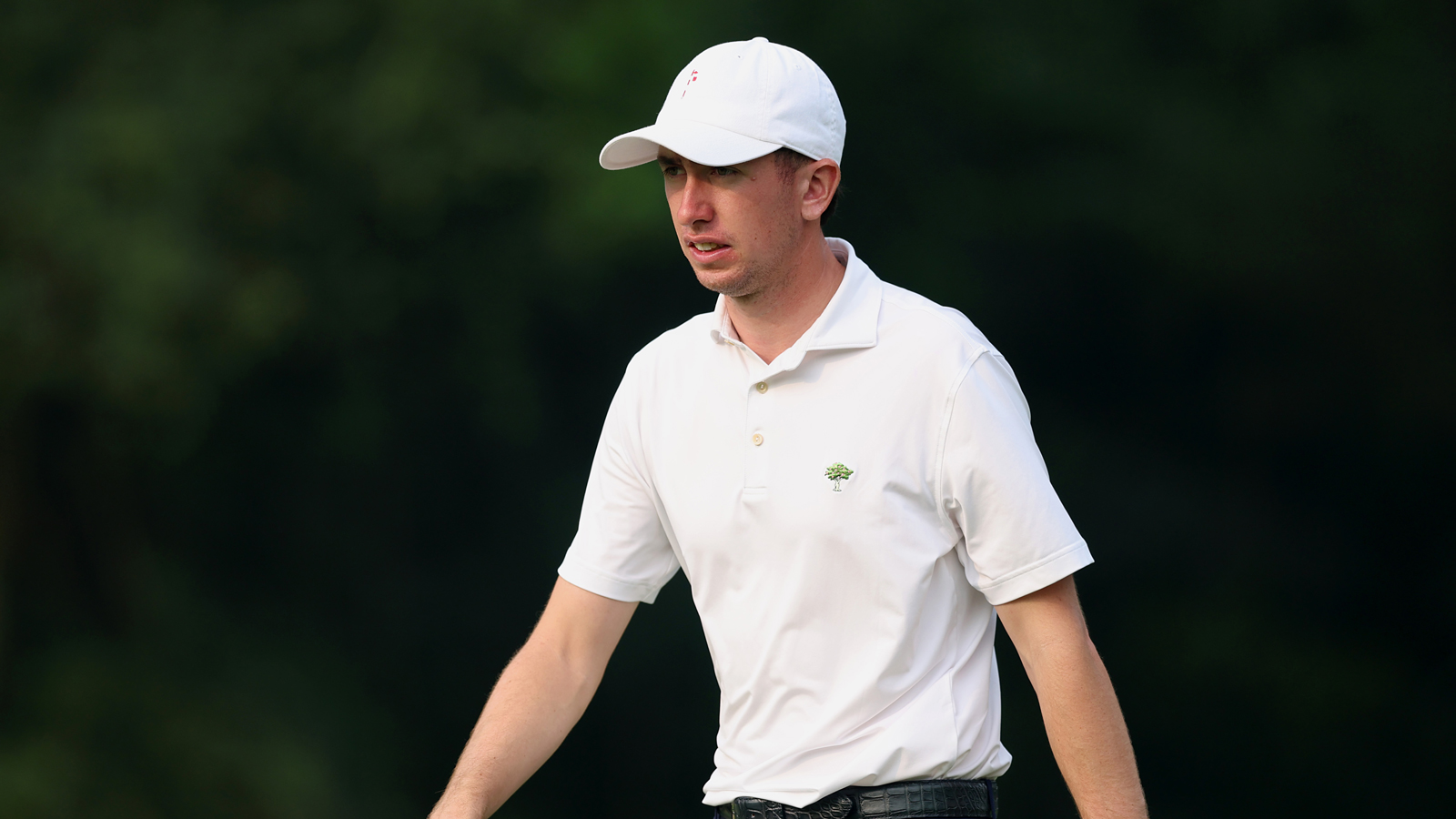 Tom McKibbin walks down the fairway