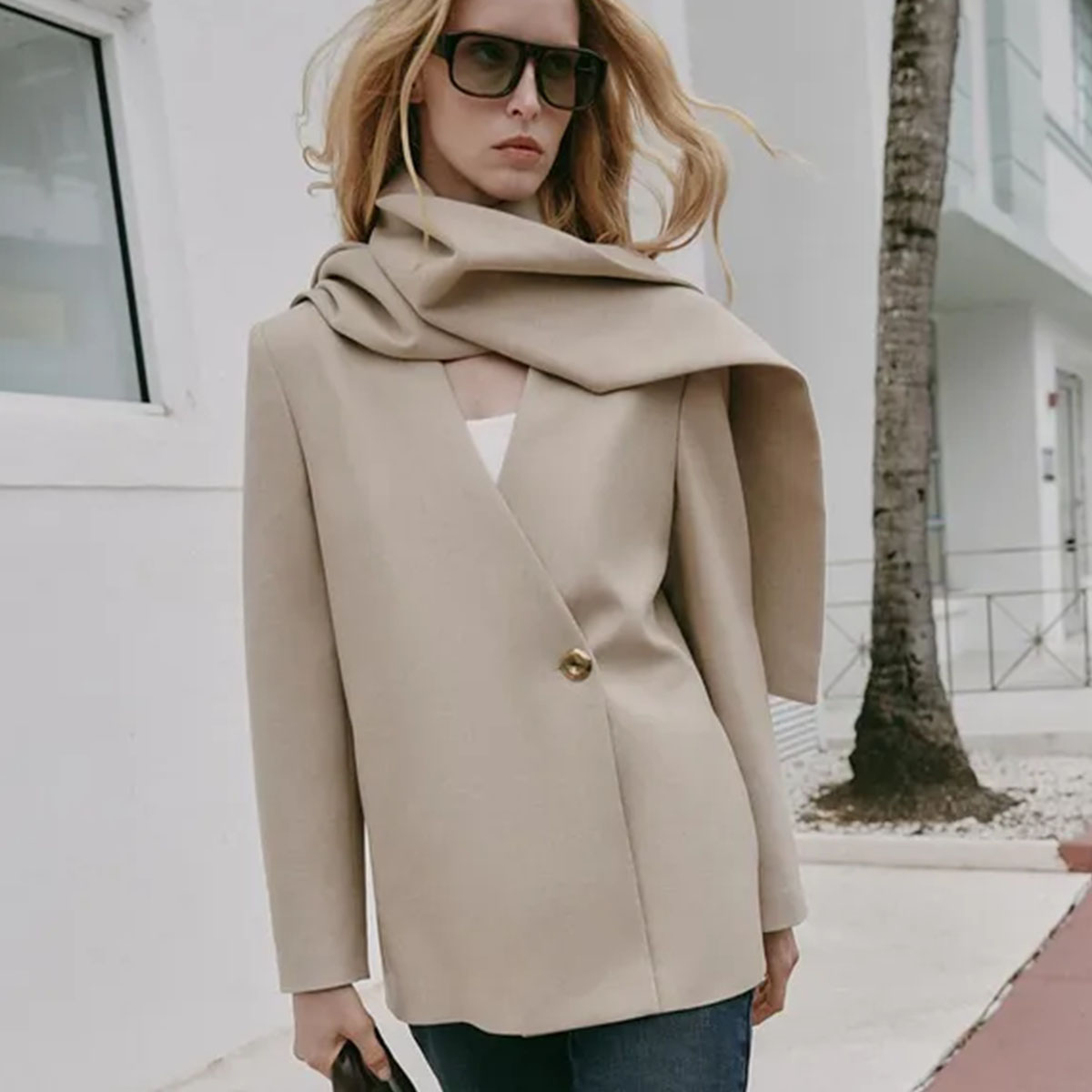 Woman in a scarf blazer