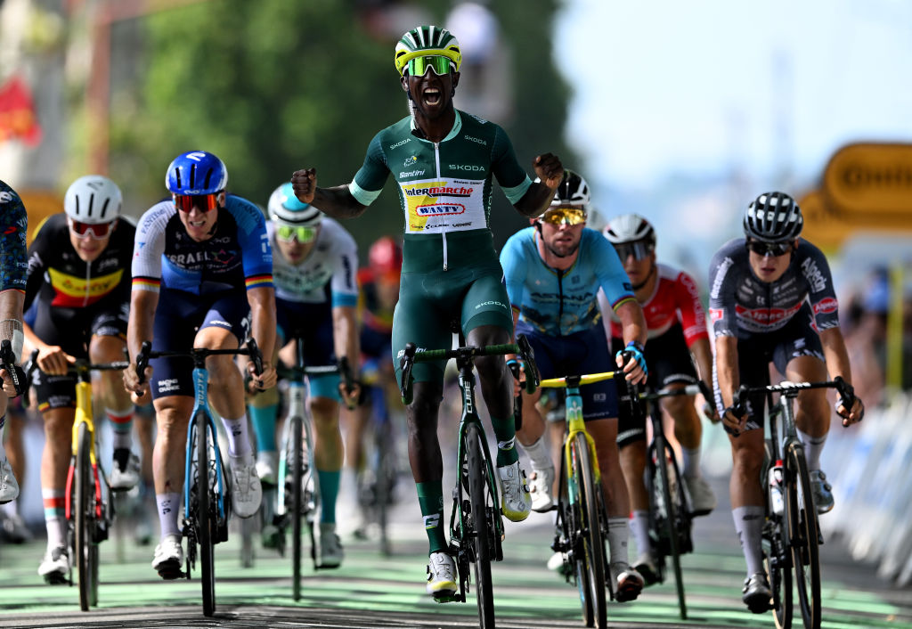 VILLENEUVE-SUR-LOT, FRANCE - JULY 11: Biniam Girmay of Eritrea and Team Intermarche - Wanty - Green Sprint Jersey (C) celebrates at finish line as stage winner during the 111th Tour de France 2024, Stage 12 a 203.6km stage from Aurillac to Villeneuve-sur-Lot / #UCIWT / on July 11, 2024 in Villeneuve-sur-Lot, France. (Photo by Tim de Waele/Getty Images)