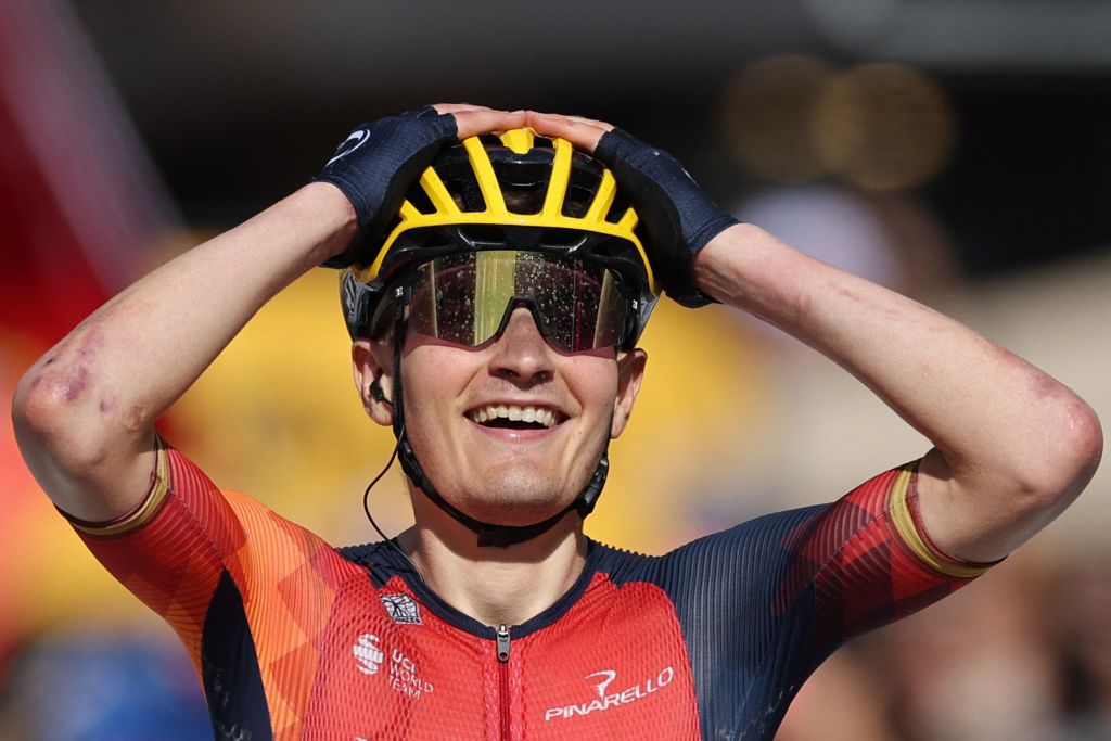 INEOS - Grenadiers' Spanish rider Carlos Rordriguez Cano cycles to the finish line to win the 14th stage of the 110th edition of the Tour de France cycling race, 152 km between Annemasse and Morzine Les Portes du Soleil, in the French Alps, on July 15, 2023. (Photo by Thomas SAMSON / AFP)