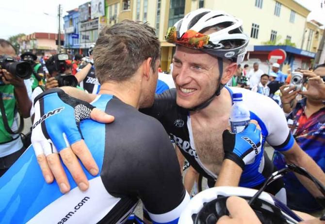 Theo Bos greets his happy teammates after the win