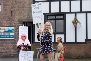 The McQueens staged a protest when they were thrown out of their home.