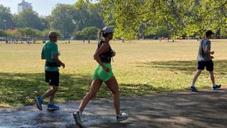 Writer Jessica running a half marathon event in the On Cloudmonsters