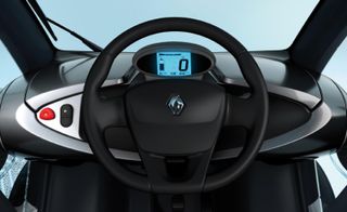 The interior of Renault's Twizy showing the steering wheel and the dashboard