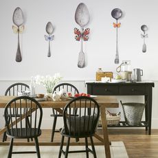 dining room with spoons feature wall 