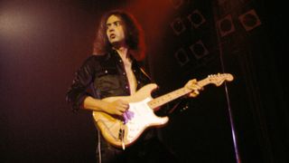 Photo of DEEP PURPLE and Ritchie BLACKMORE; with Deep Purple, performing live onstage, with spotlights and dry ic