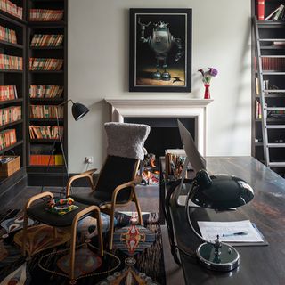 home office with steel desk bauhaus lamp and rex ray rugs