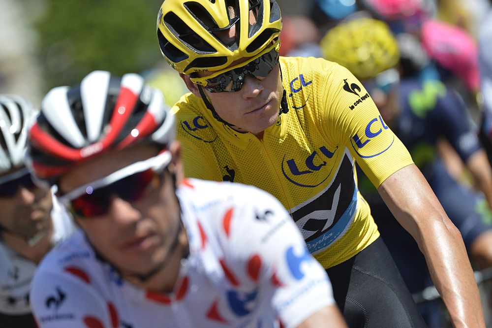 Chris Froome (Tam Sky) sits in the field