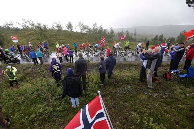 The peloton receives some roadside encouragement during the opening stage