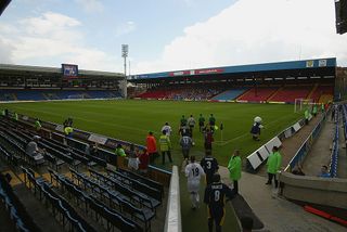 LONDON - AUGUST 10: The players come on at the start of the Wimbledon v Gillingham Nationwide League Division One match at Selhurst Park in London, England on August 10, 2002. (Photo by Phil Cole/Getty Images)