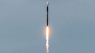 A black Firefly Aerospace rocket launches into space on Dec. 22, 2023