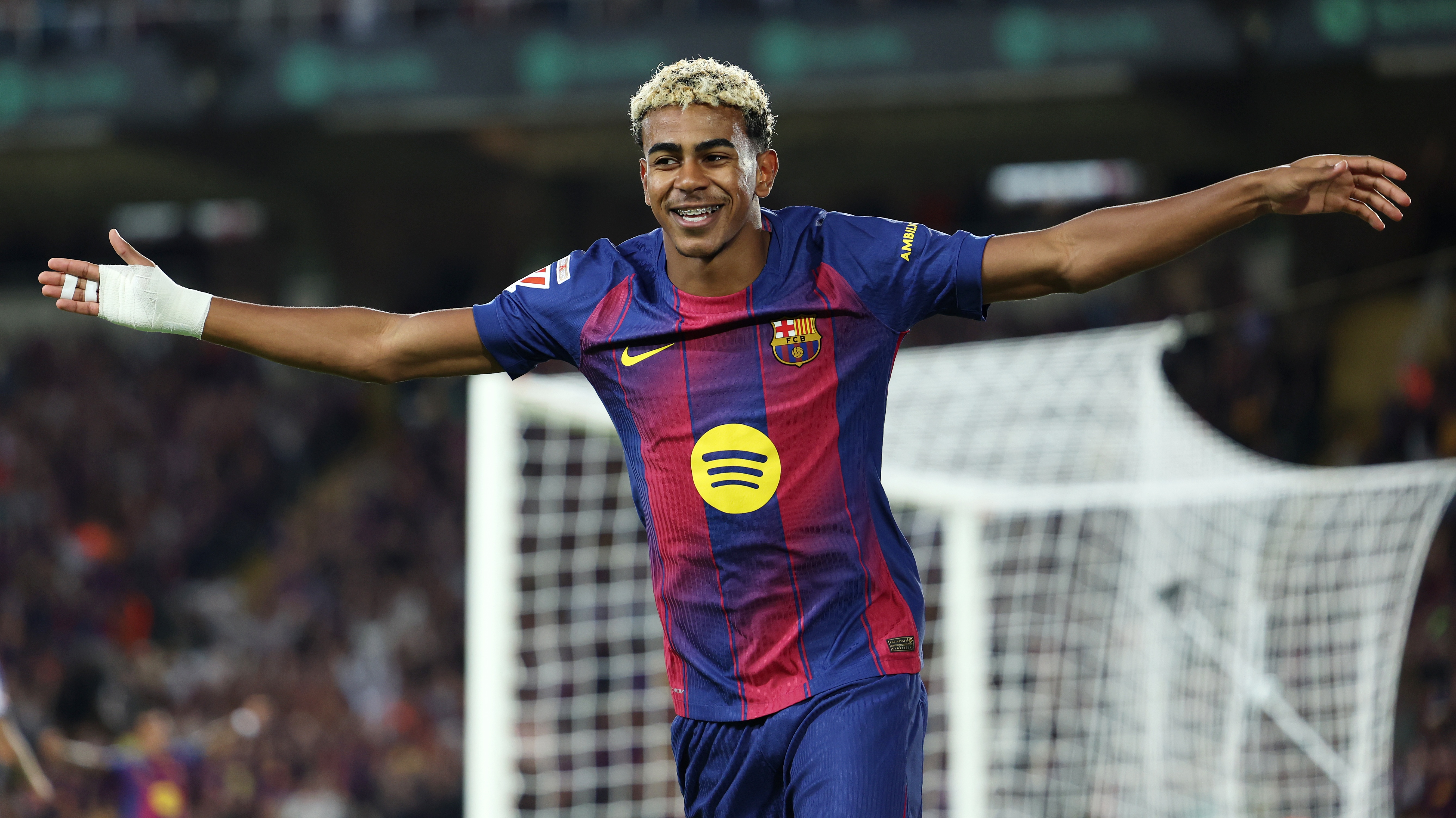 BARCELONA, SPAIN - SEPTEMBER 28: Lamine Yamal of FC Barcelona celebrates his teams second goal scored by Robert Lewandowski of FC Barcelona (not pictured) during the LaLiga EA Sports match between FC Barcelona and Real Sociedad at Estadi Olimpic Lluis Companys on September 28, 2025 in Barcelona, Spain.