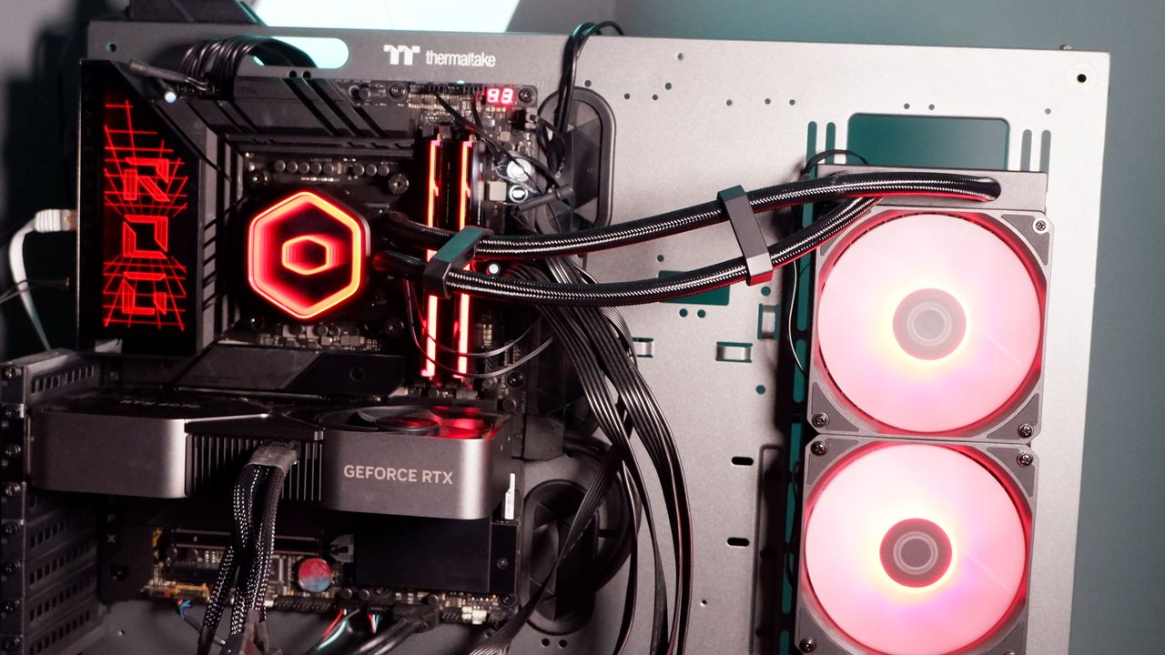 A Cooler Master MasterLiquid 360 Core II liquid cooler set-up on a test bench.